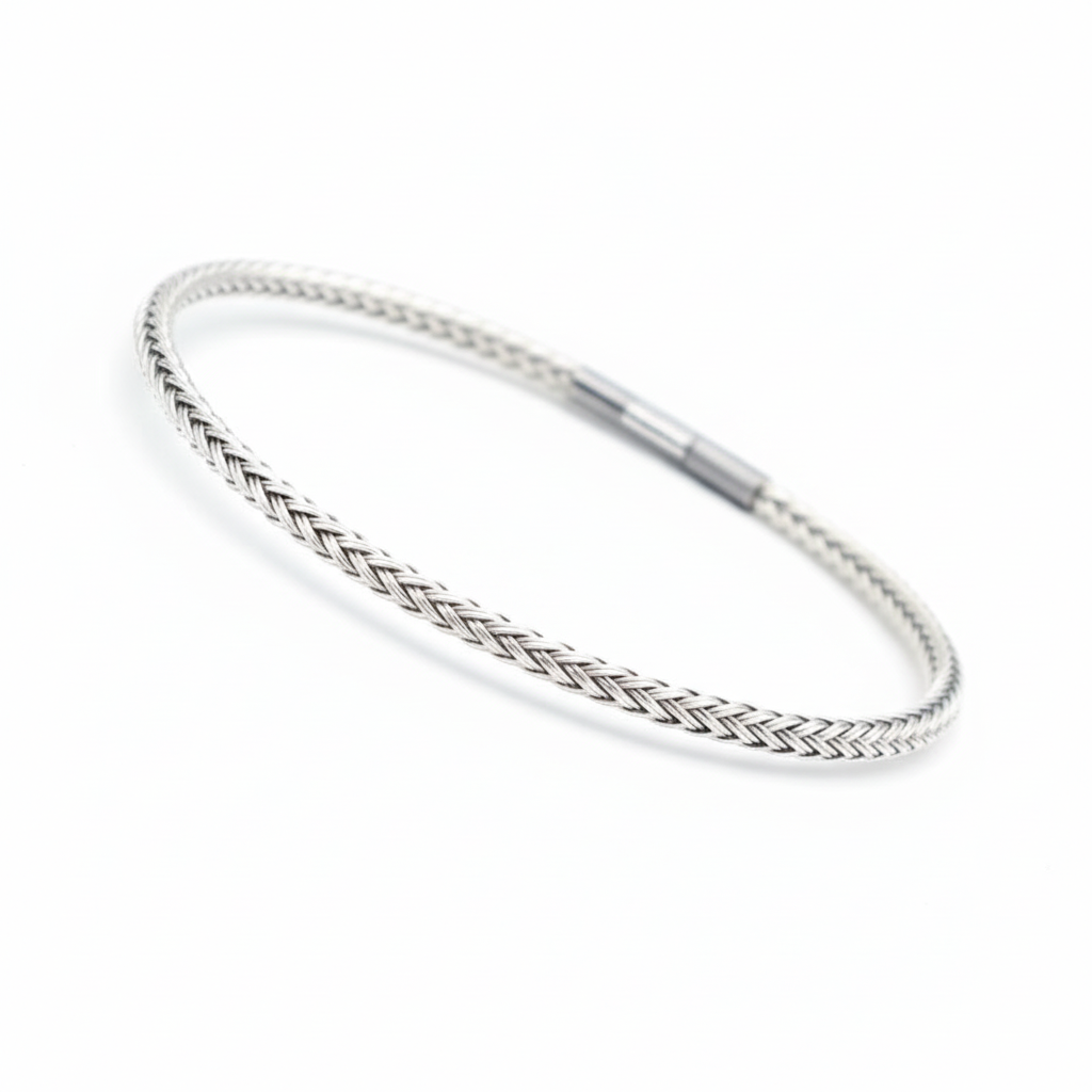 Silver braided bangle bracelet on white background