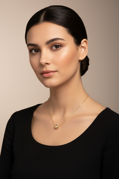 18K gold plated minimalist ball pendant necklace on model