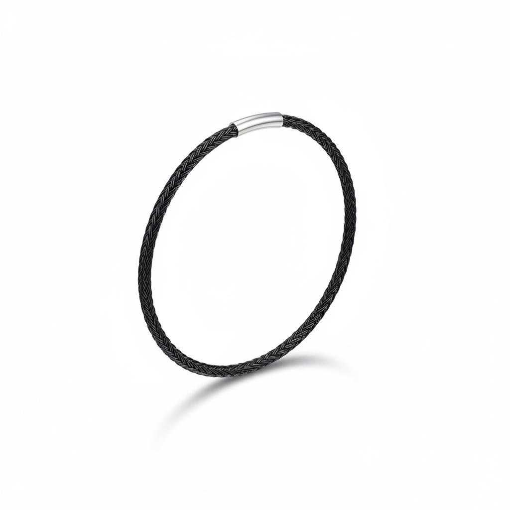 Black braided bangle bracelet on white background