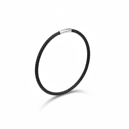 Black braided bangle bracelet on white background