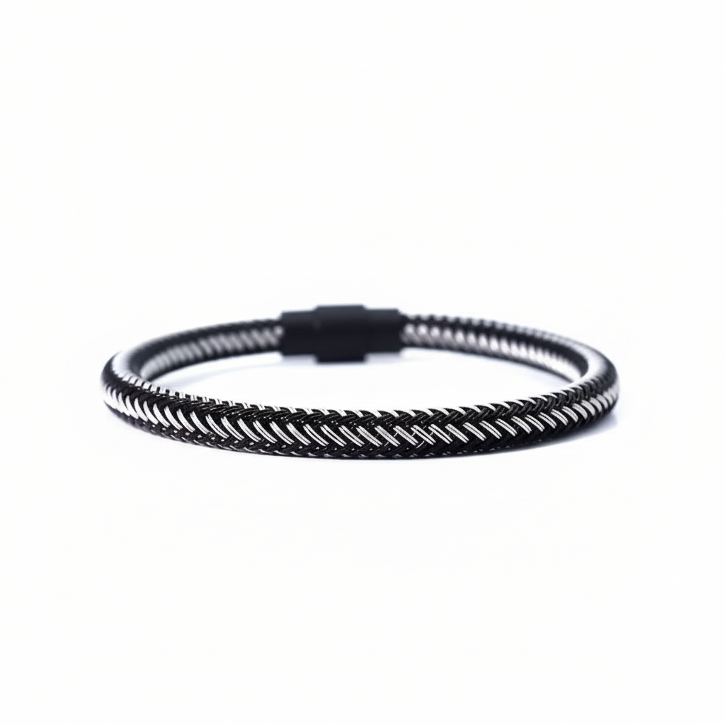 Black braided bracelet on white background