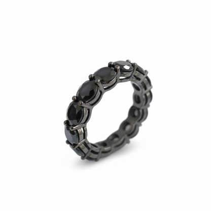 Black gemstone ring with white background