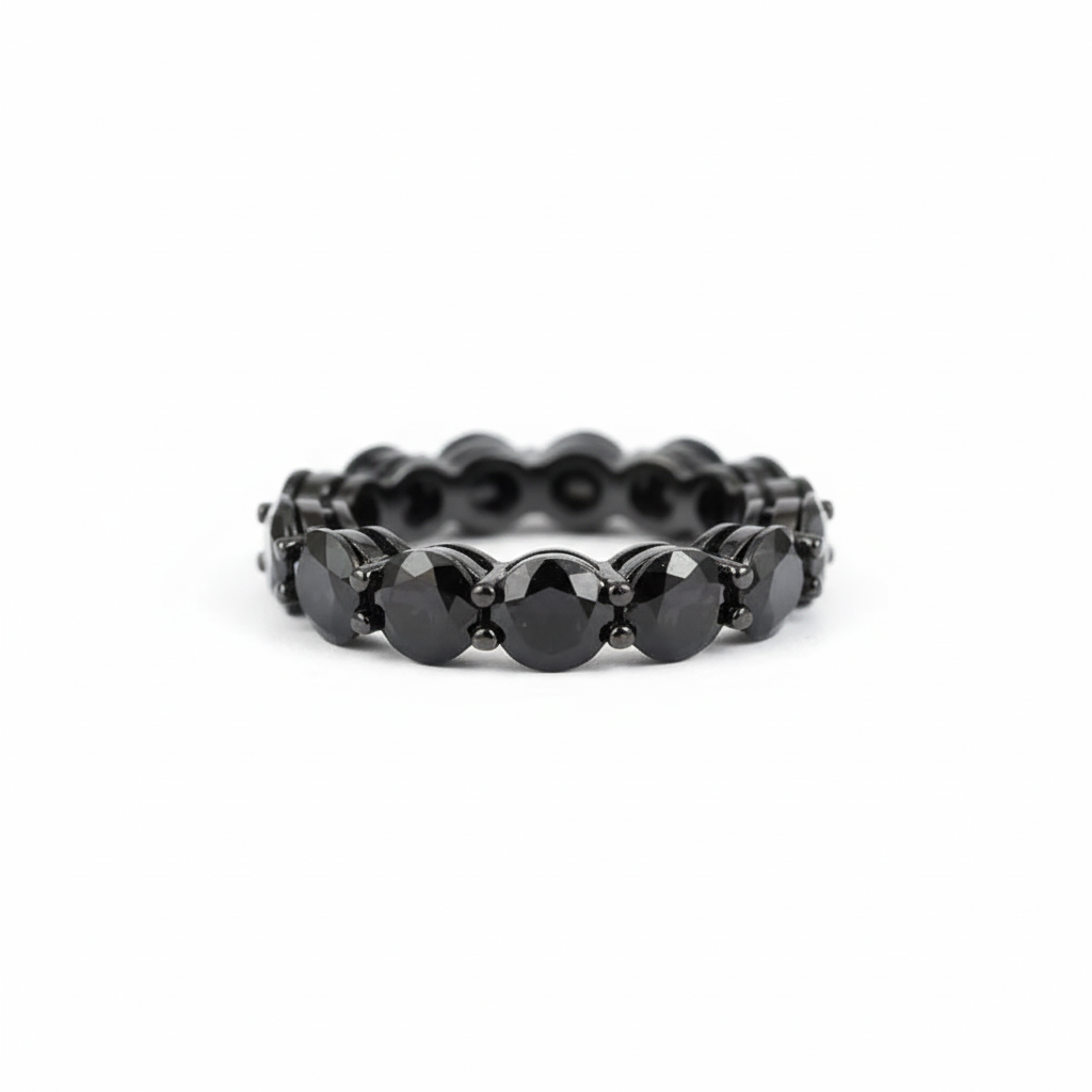 Black gemstone ring with white background