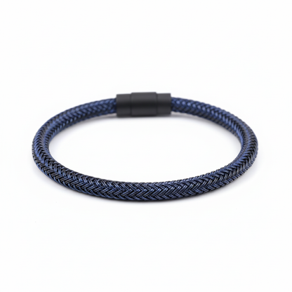 Dark blue braided bracelet on white background