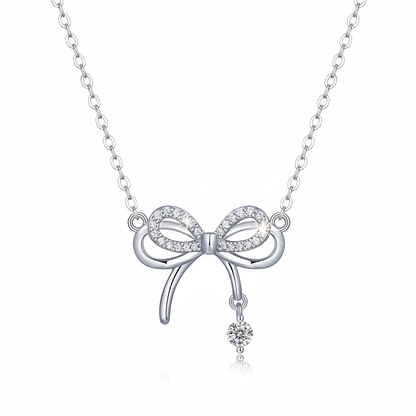 Enhanced silver bow necklace with moissanite stones