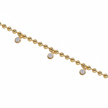 Gold bracelet with white background