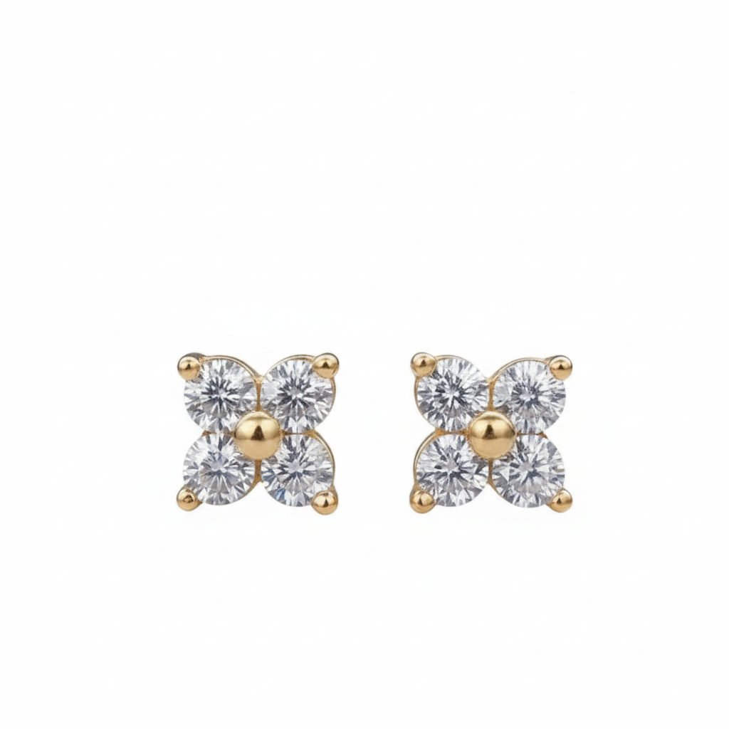 Gold flower earrings with white background
