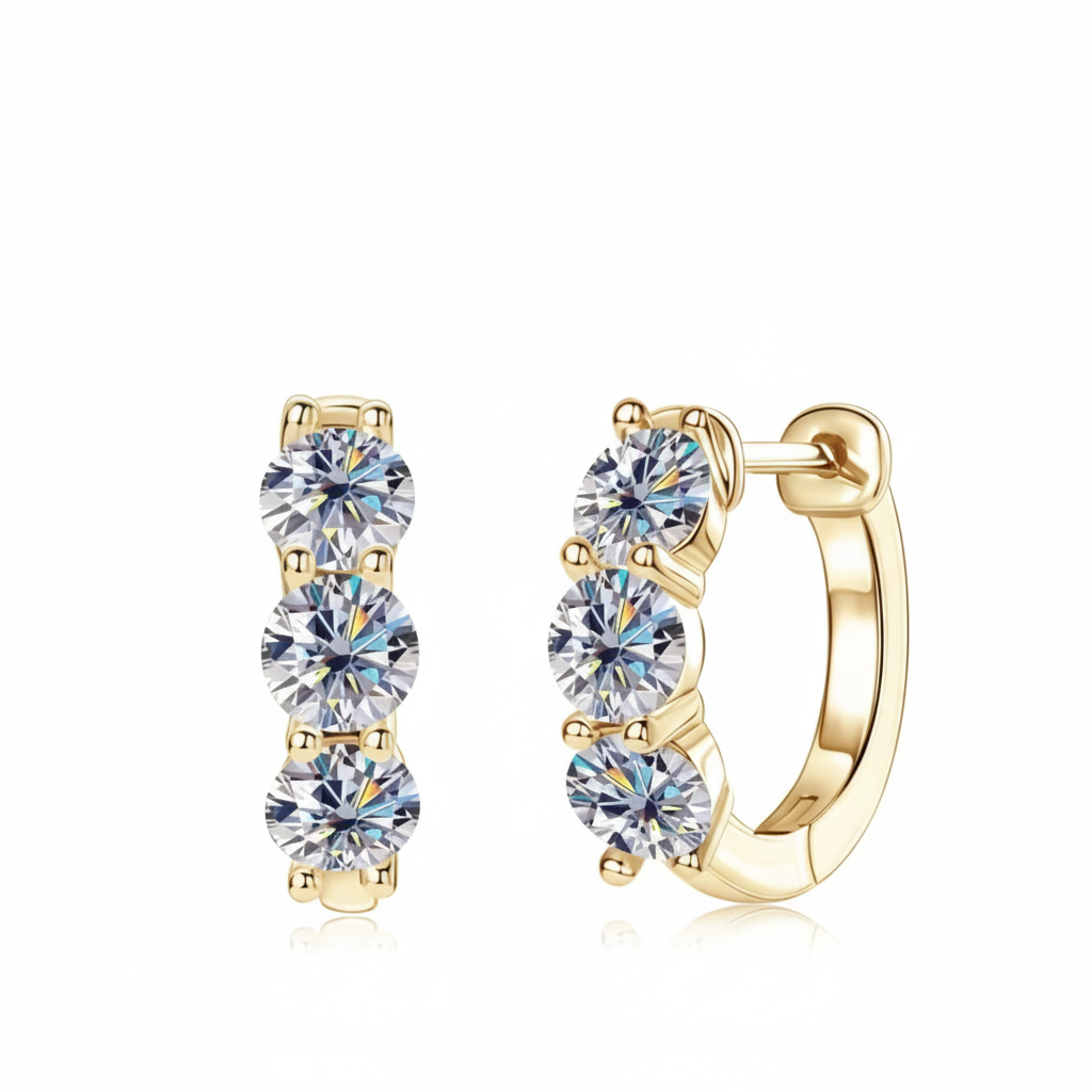 Gold moissanite hoop earrings with white background
