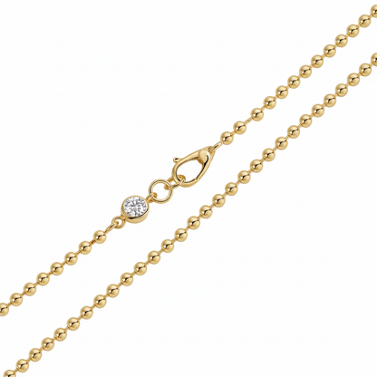 Gold necklace with white background