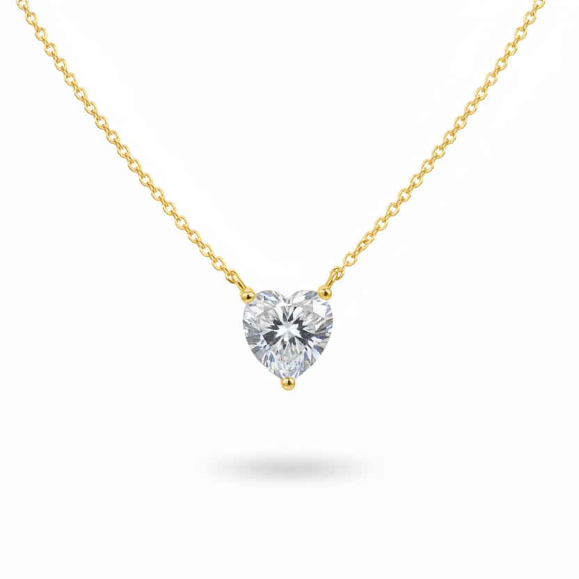 Heart moissanite necklace with silver chain on white background