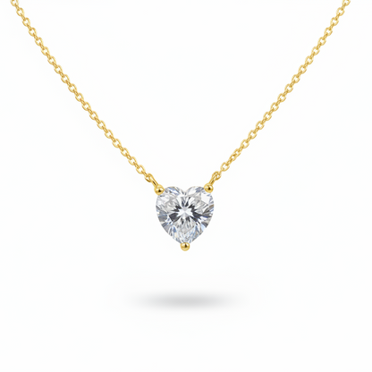 Heart moissanite necklace with silver chain on white background