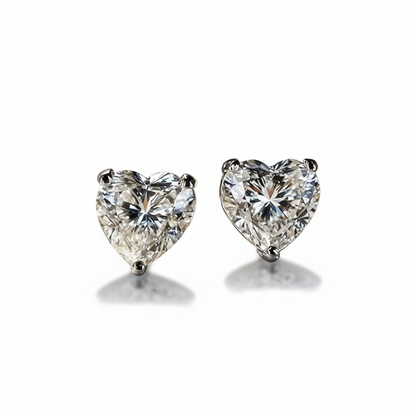 Heart-shaped moissanite earrings with white background