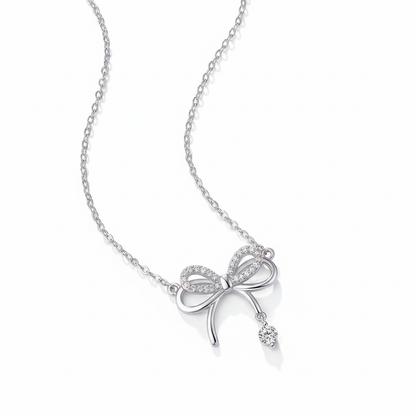 Moissanite bow necklace on white background