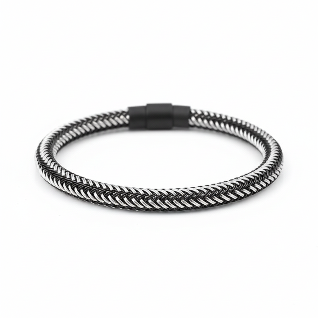 Silver braided bracelet on white background